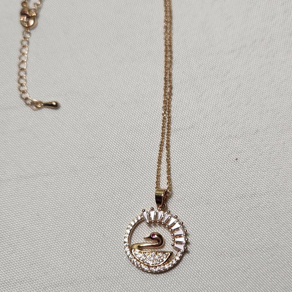 Simulated diamond rose gold tone Swan pendant with adjustable chain